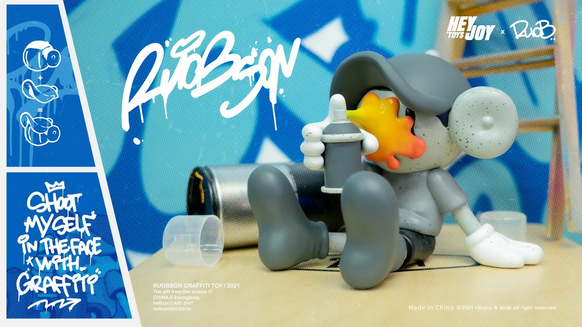 He B shoots his own face with spray paint trendy doll