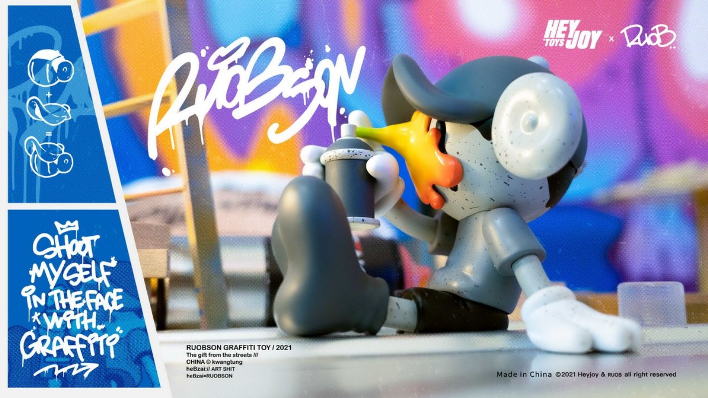 He B shoots his own face with spray paint trendy doll