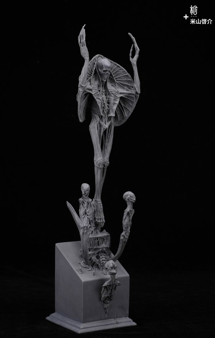 RED STATUE AND CANNON