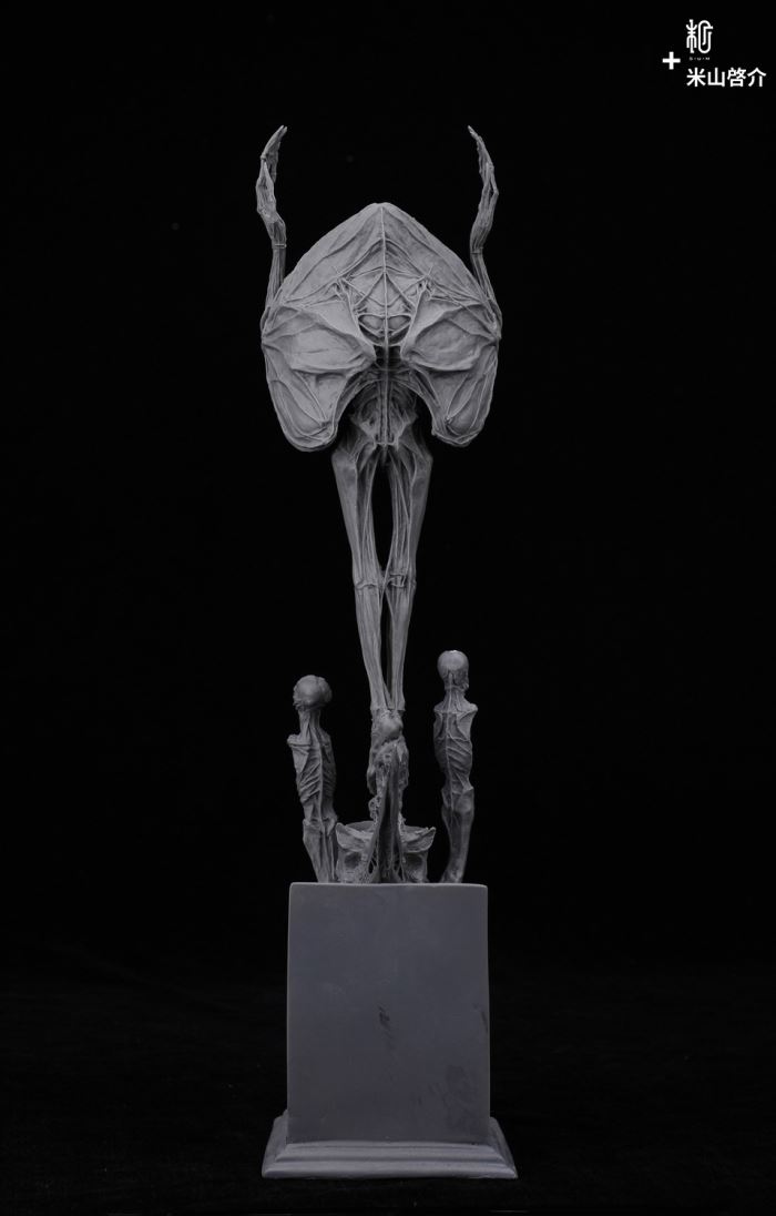 RED STATUE AND CANNON