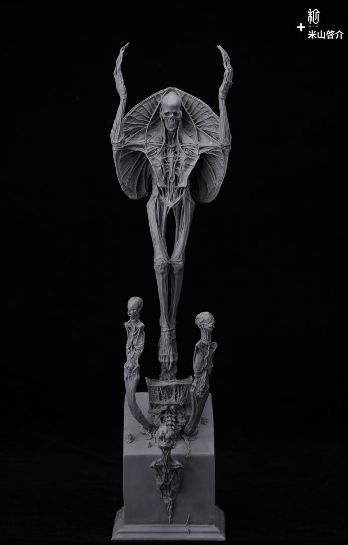 RED STATUE AND CANNON