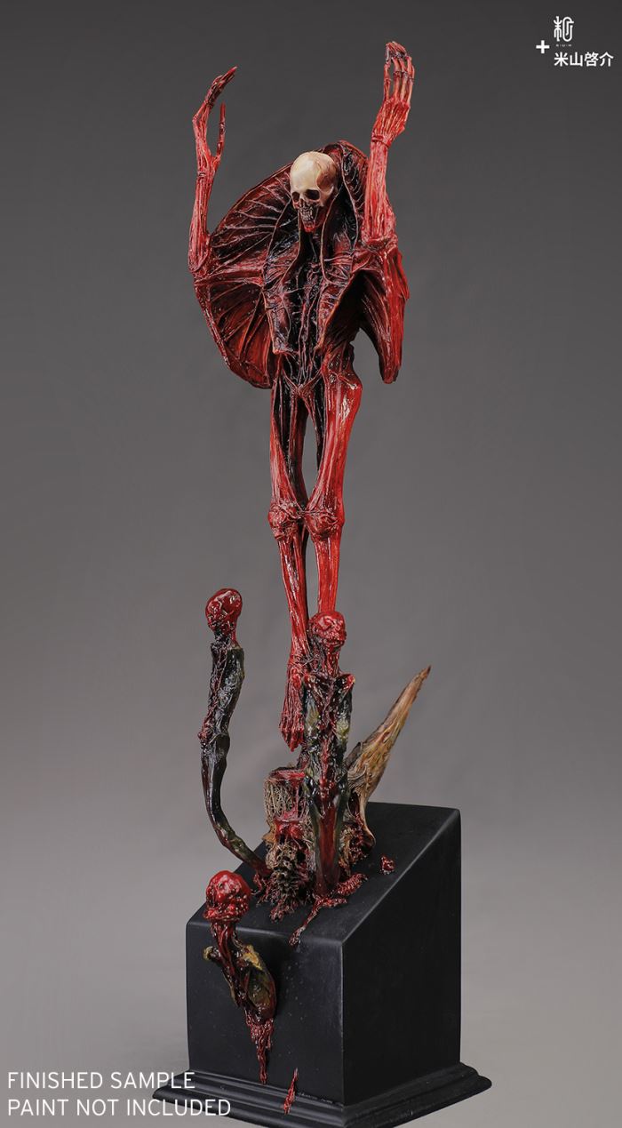 RED STATUE AND CANNON