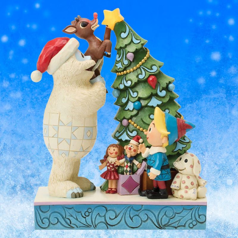 Bumble Holding Rudolph by Tree