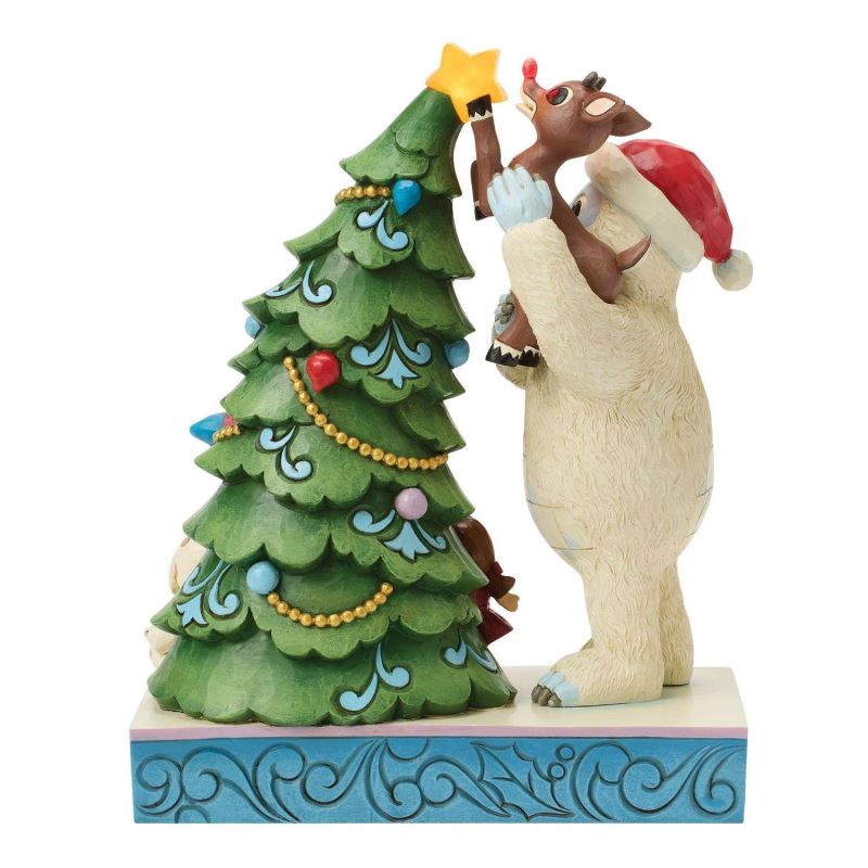 Bumble Holding Rudolph by Tree