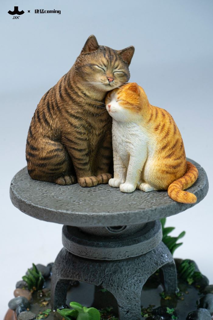 Cats Resting Among Stones