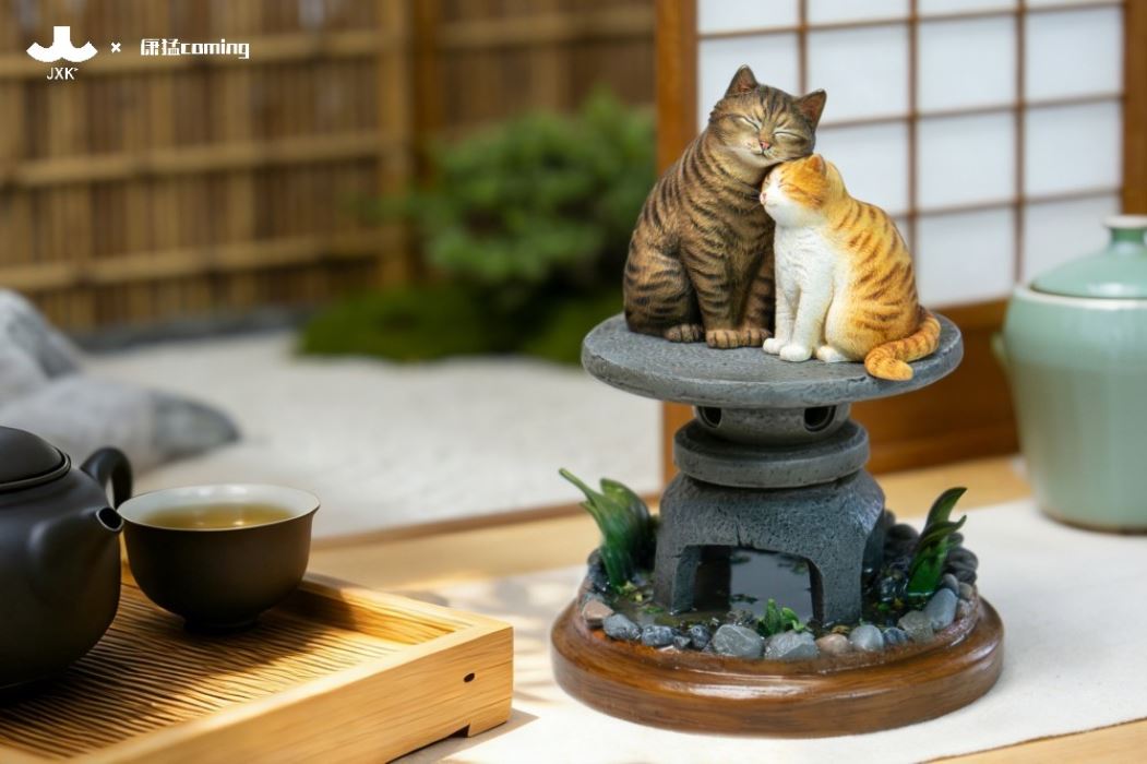Cats Resting Among Stones
