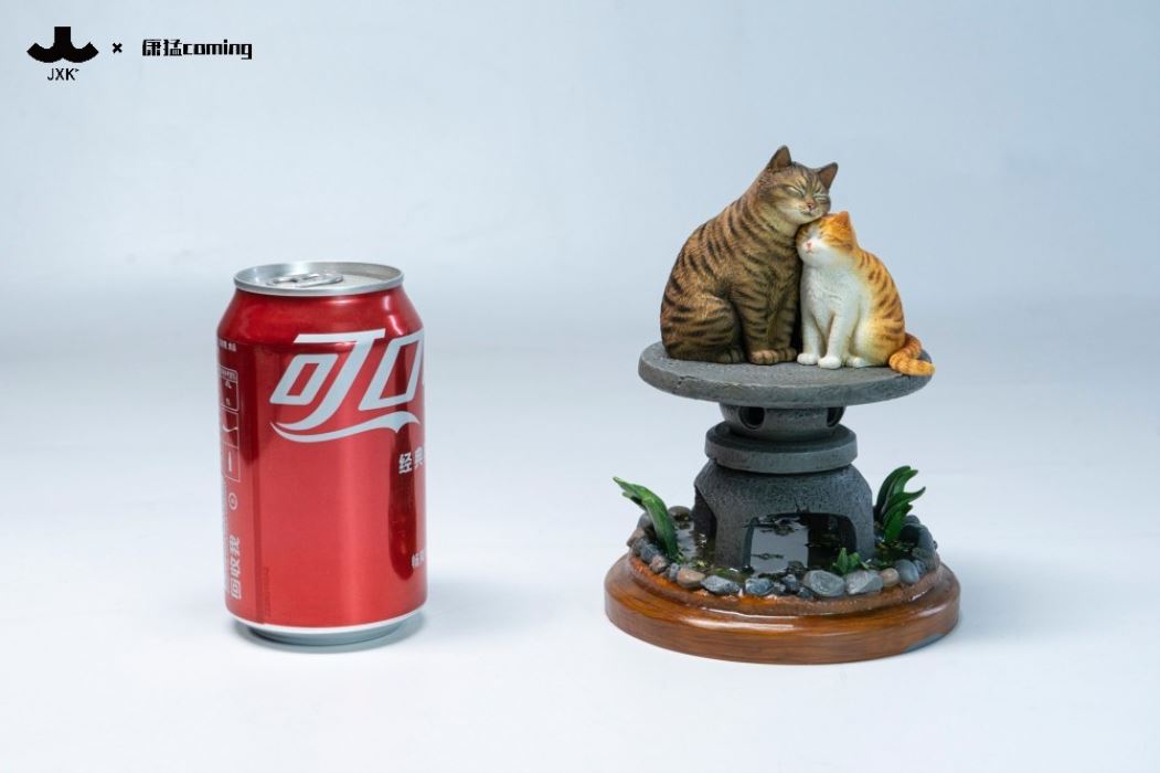 Cats Resting Among Stones