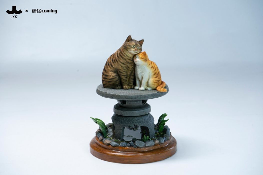 Cats Resting Among Stones